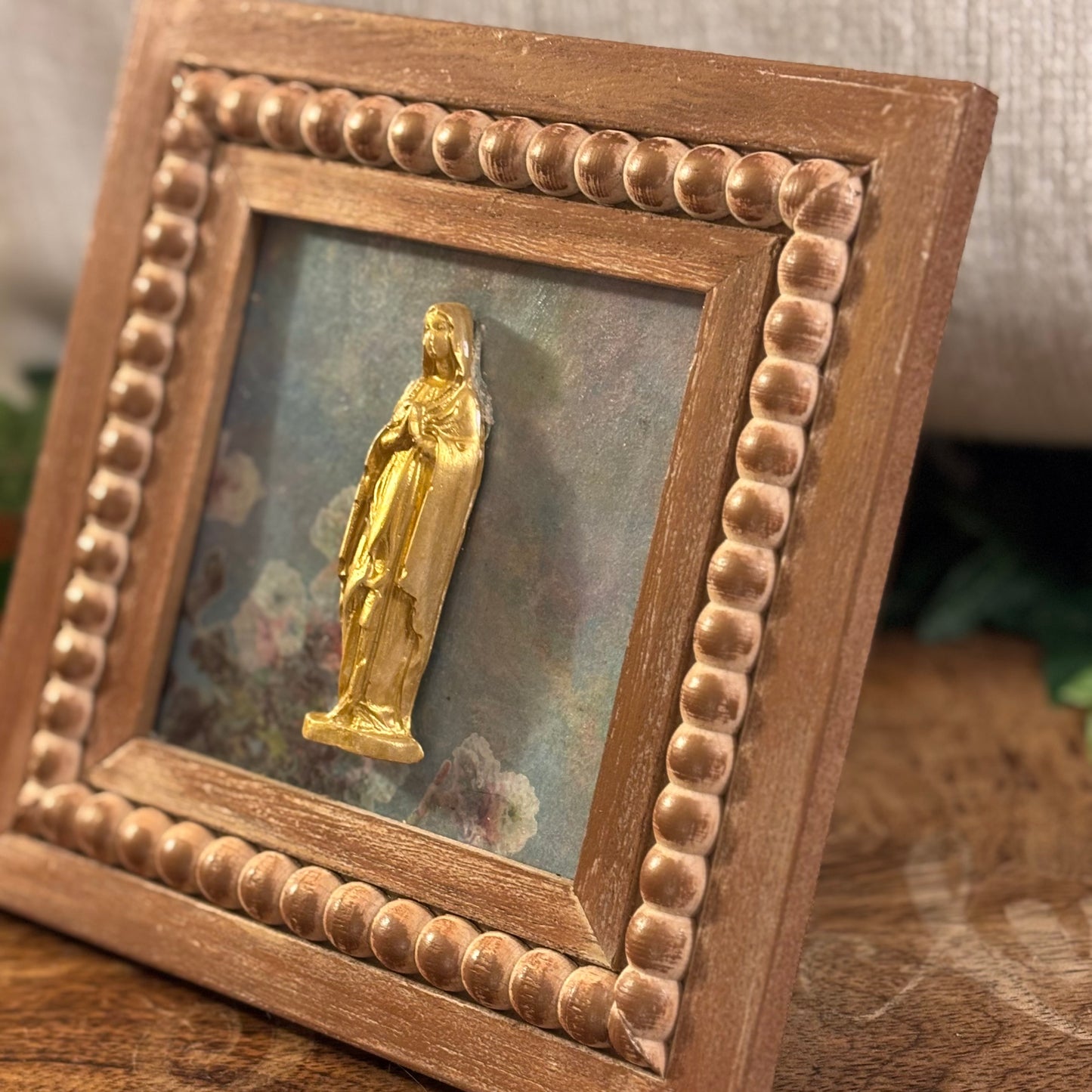 Casted Gold Virgin Mary on Beaded Wood Frame