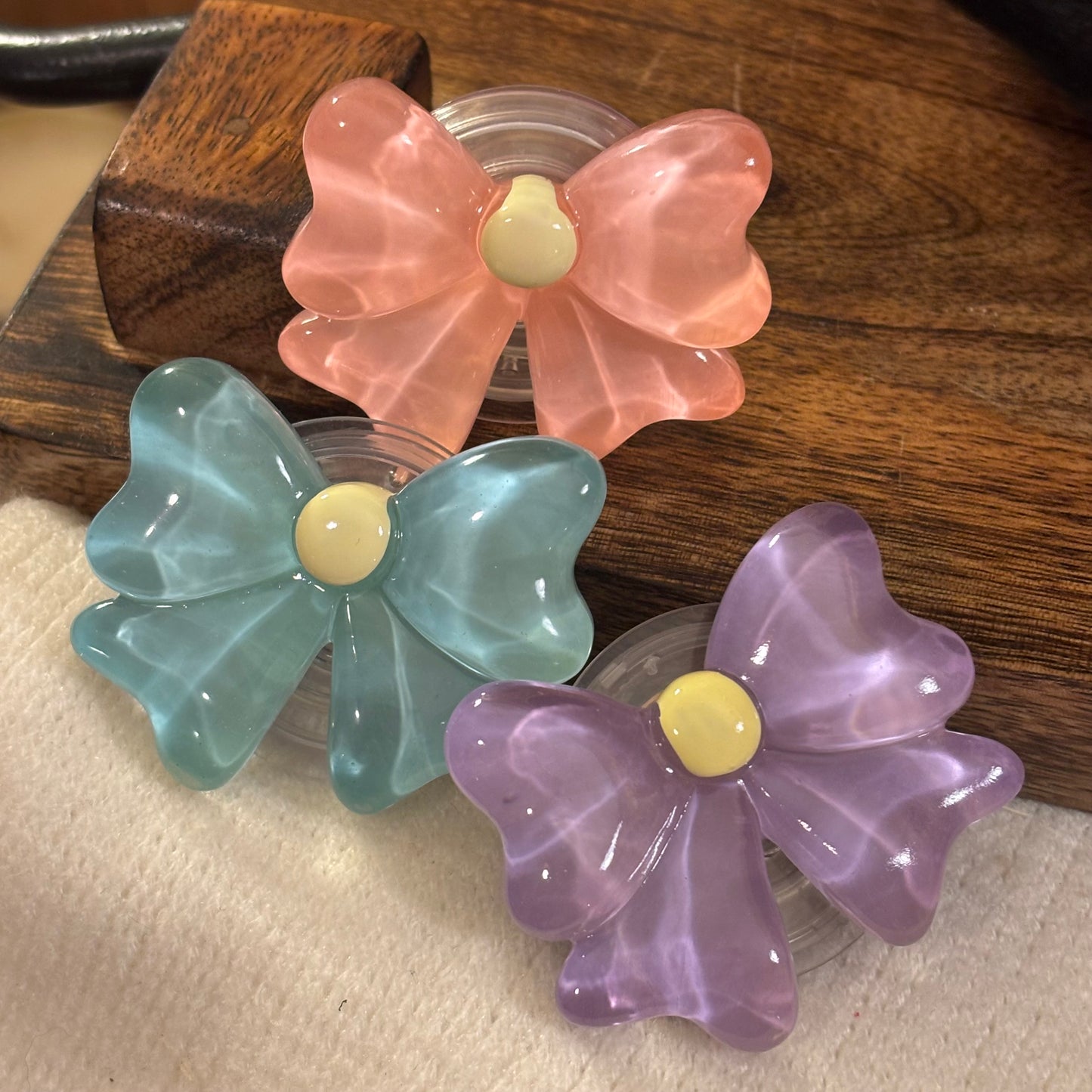Vibrant Bow Phone Stand - Adorable Desktop Grip With Folding Design
