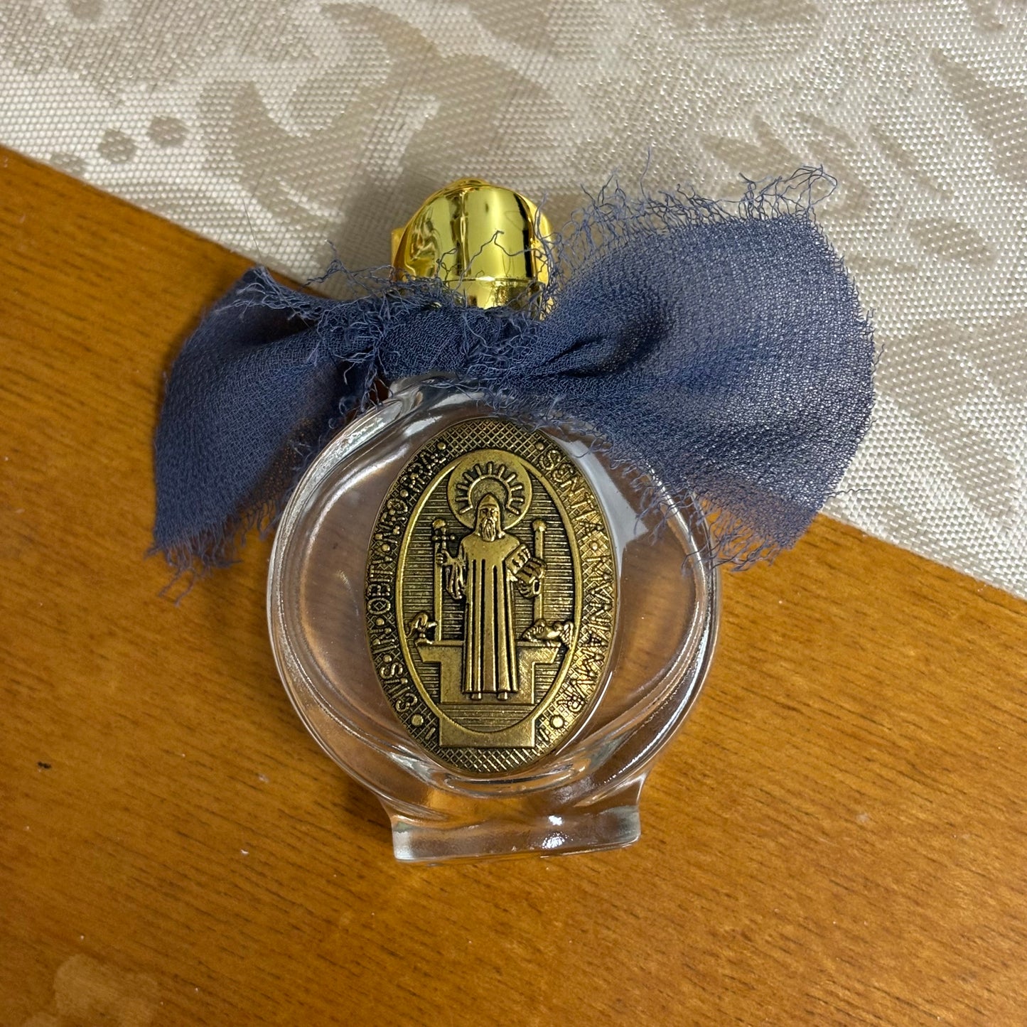 Holy Water Bottle featuring Saint Benedict or Our Lady of Guadeloupe
