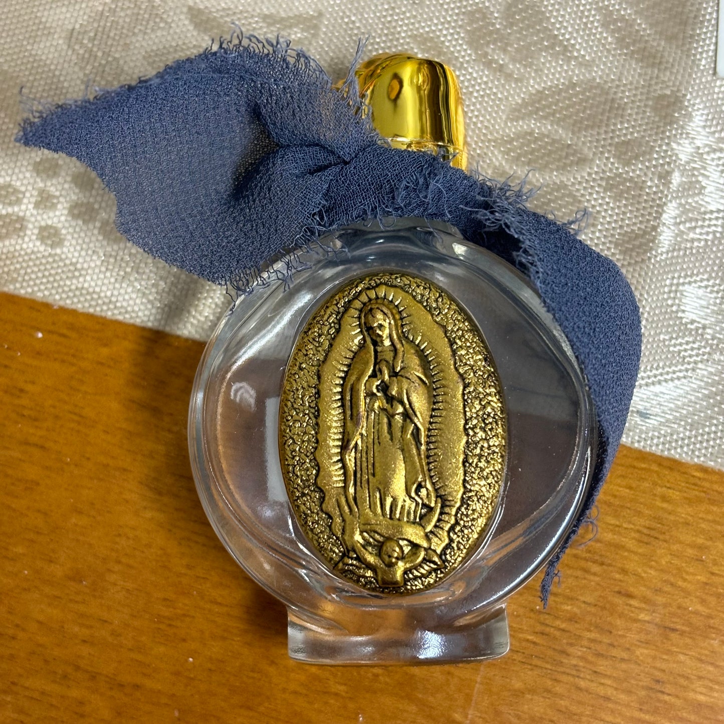 Holy Water Bottle featuring Saint Benedict or Our Lady of Guadeloupe
