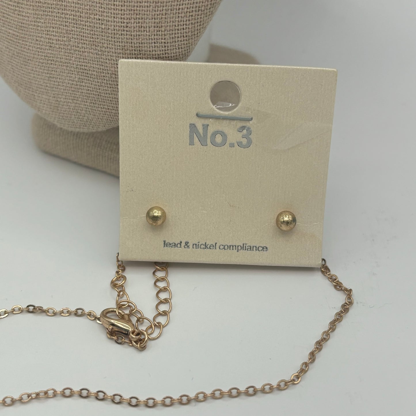 Gold Metal Necklace with Black Oval Pendant