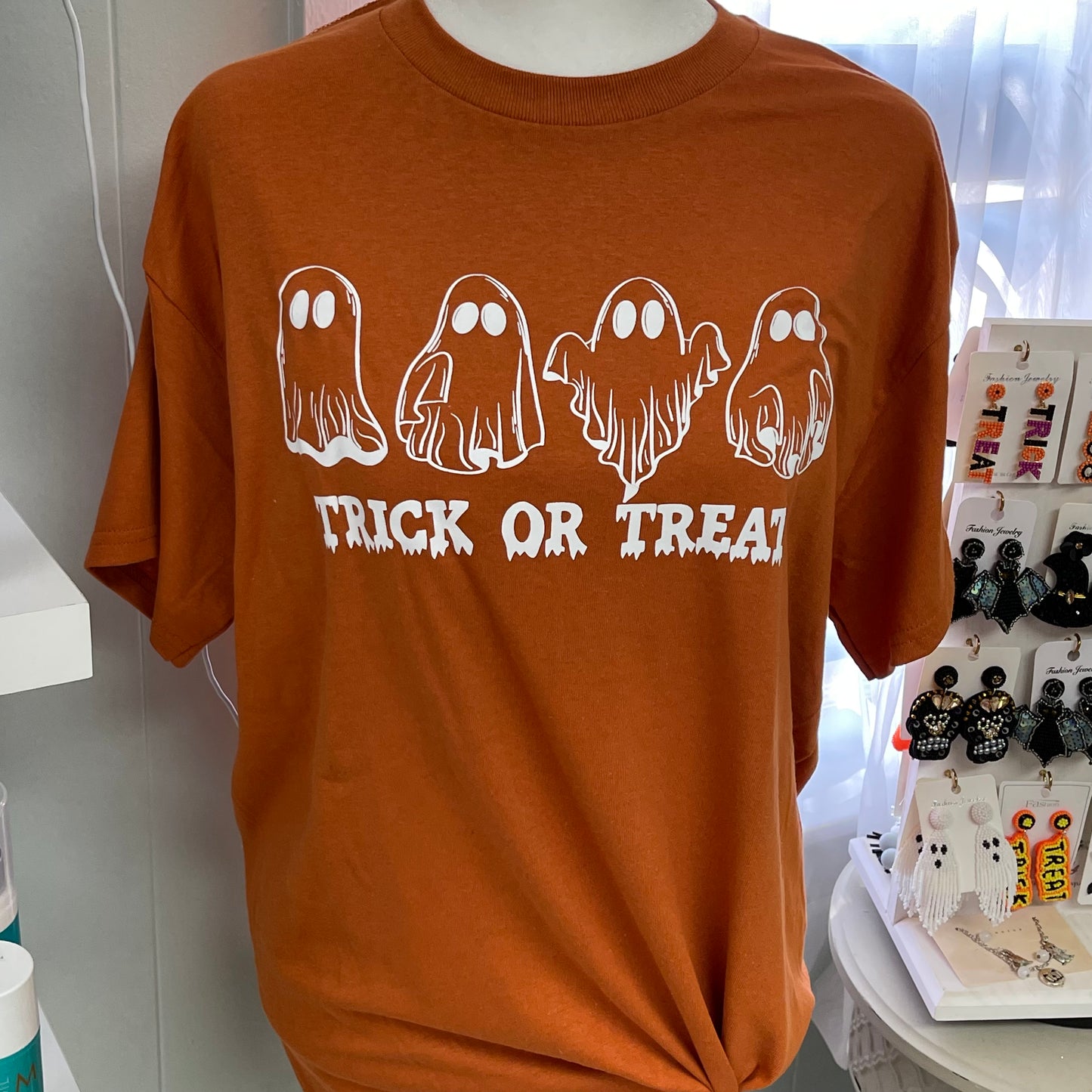 Trick or Treat Featuring Ghosts Halloween Graphic Tee
