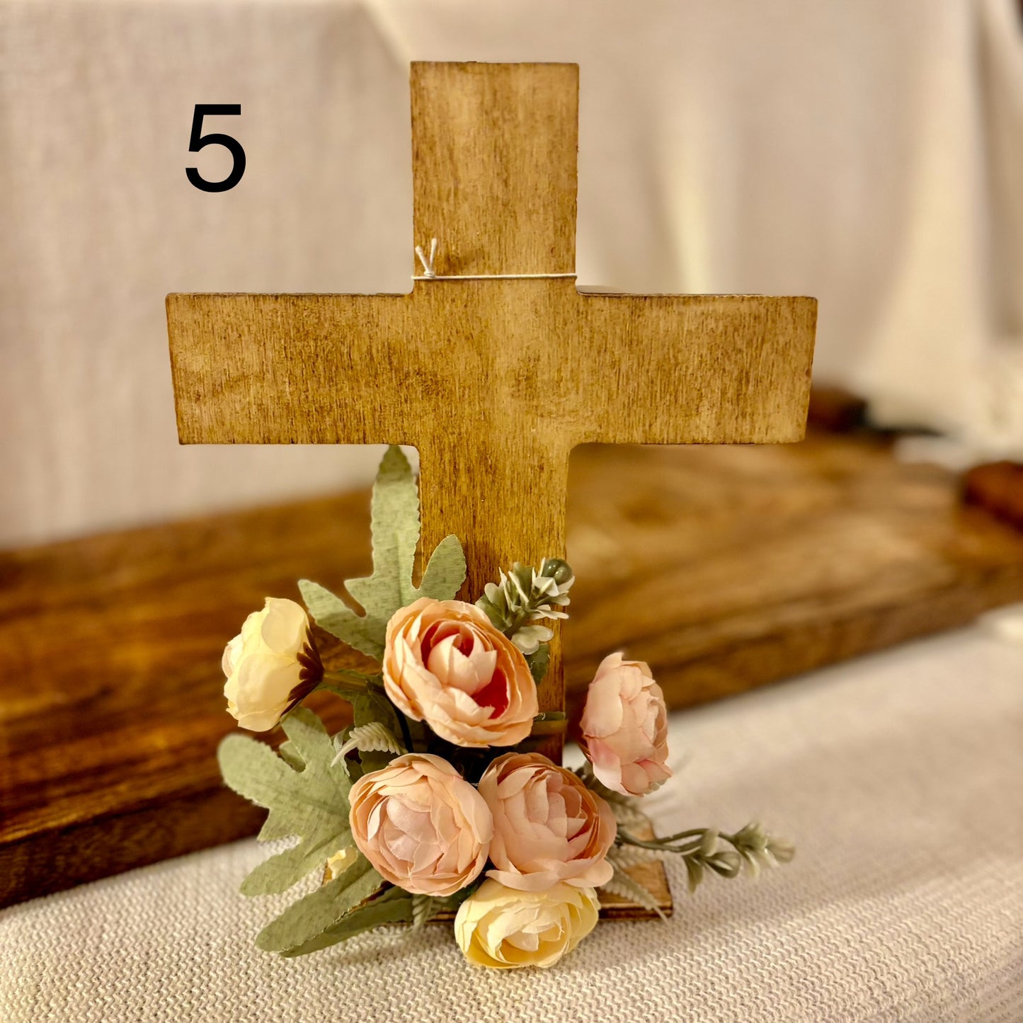 Handmade Stained or Chalk Painted Wooden Cross with Floral Arrangement at Base