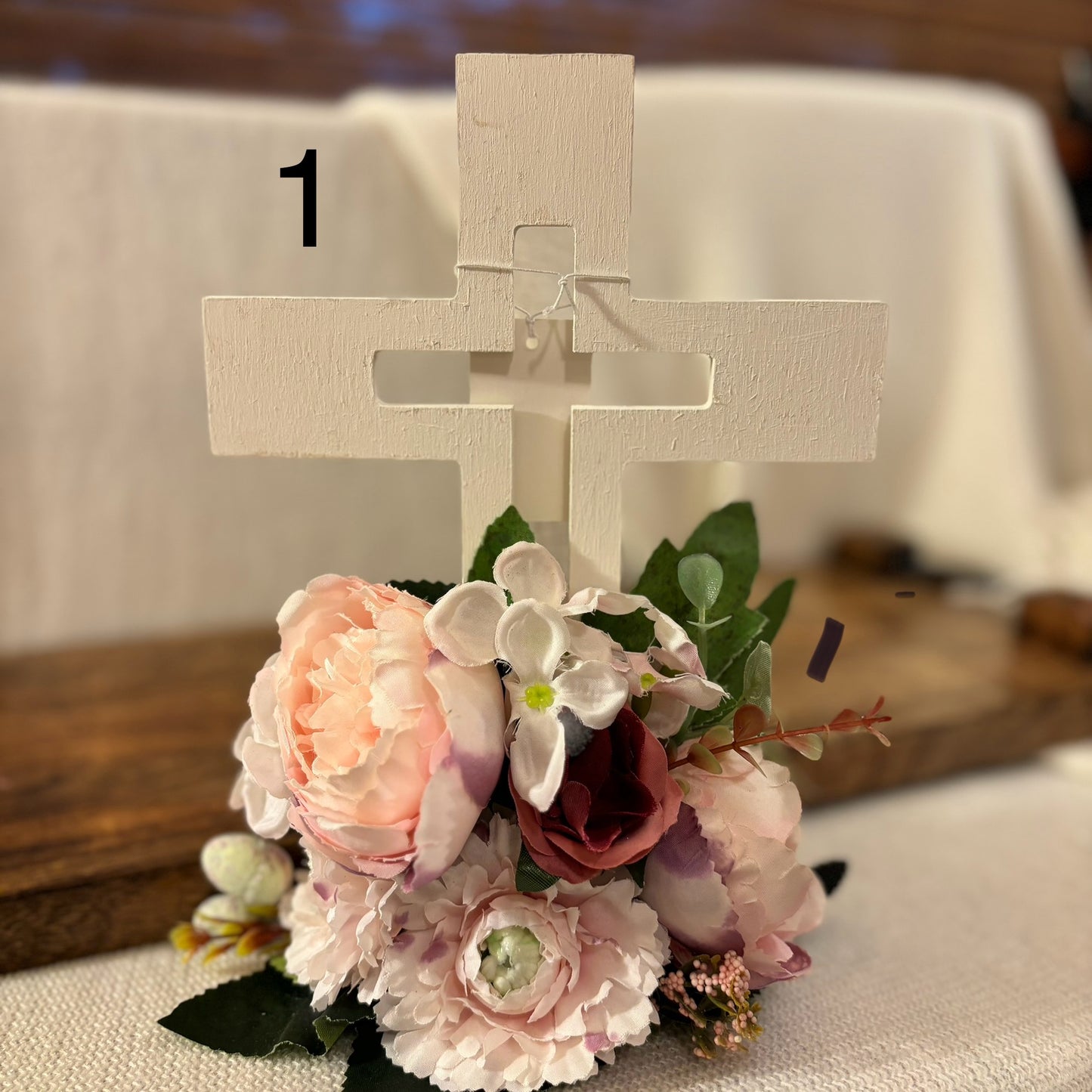 Handmade Stained or Chalk Painted Wooden Cross with Floral Arrangement at Base