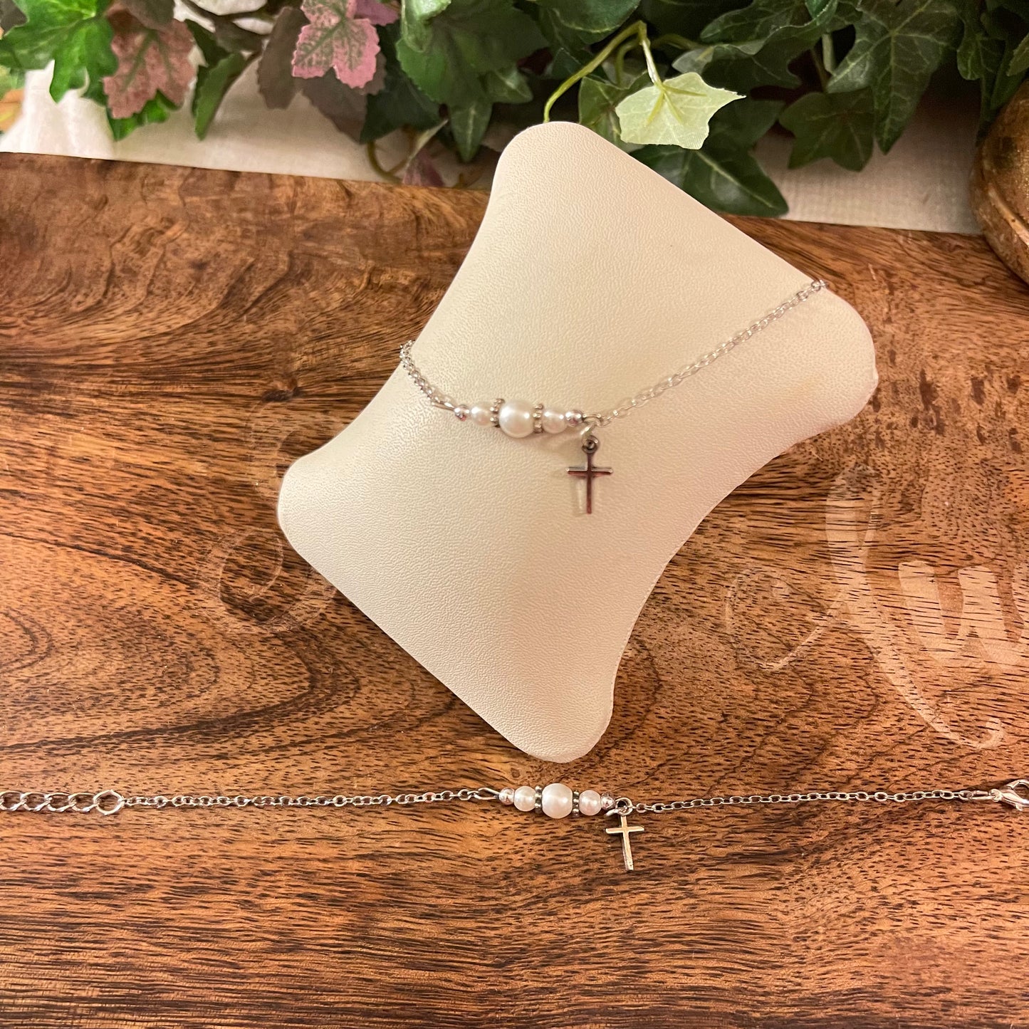 Silver and Pearl Bracelet with Clasp Closure and Cross Charm