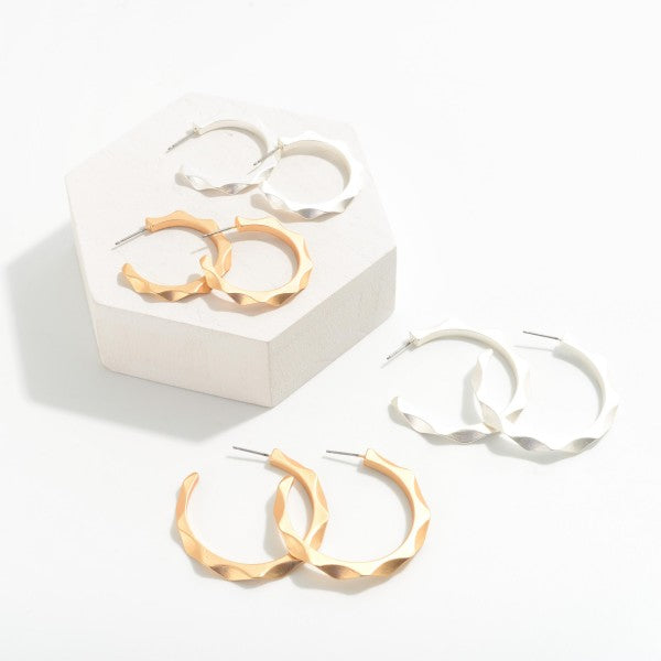 Worn Silver Hoop Earrings