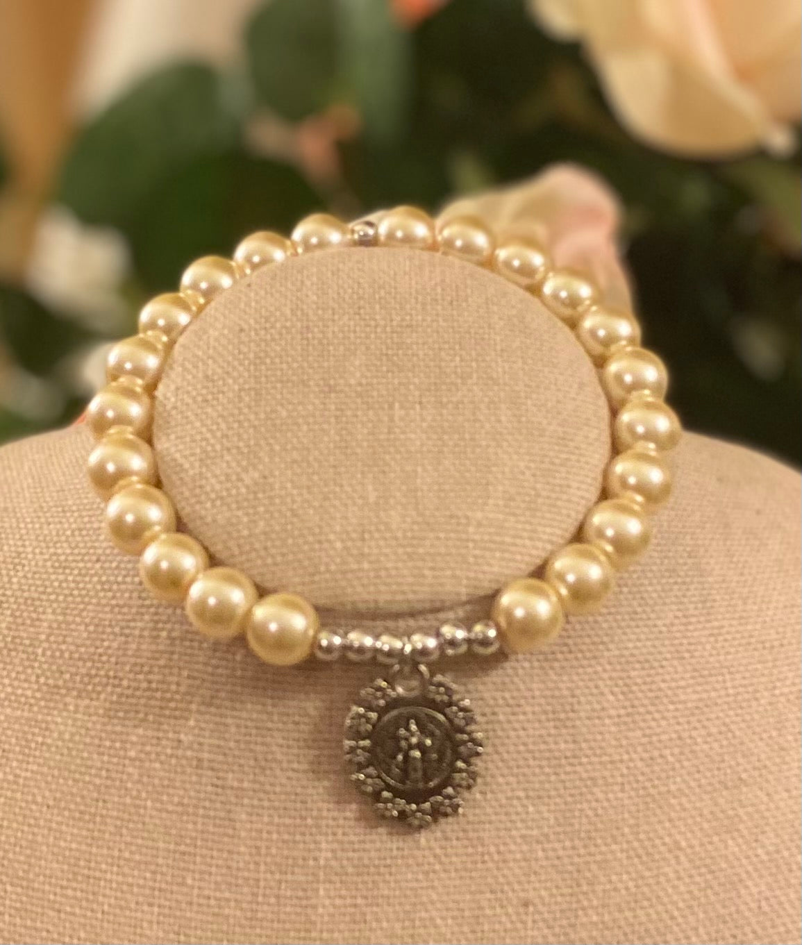 st benedict pearl stretch bracelet with charm