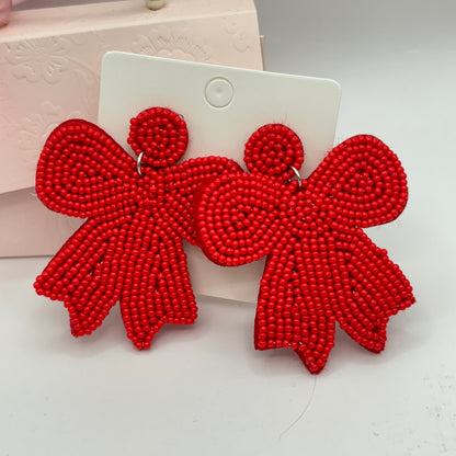 Bow Statement Earrings in Red or White