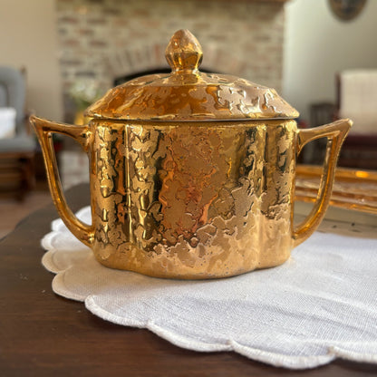 1950s mid-century "weeping bright gold" ceramic creamer and sugar set with a matching tray.