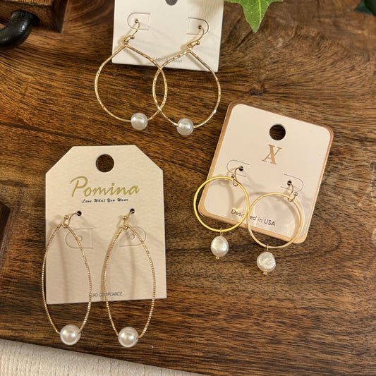 Gold Dangle Earrings Adorned with Pearls