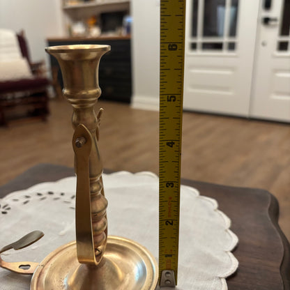 Brass Chamberstick Doubles as a Wall Sconce