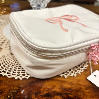 Cosmetic Bag Featuring Embroidered Pink Bow