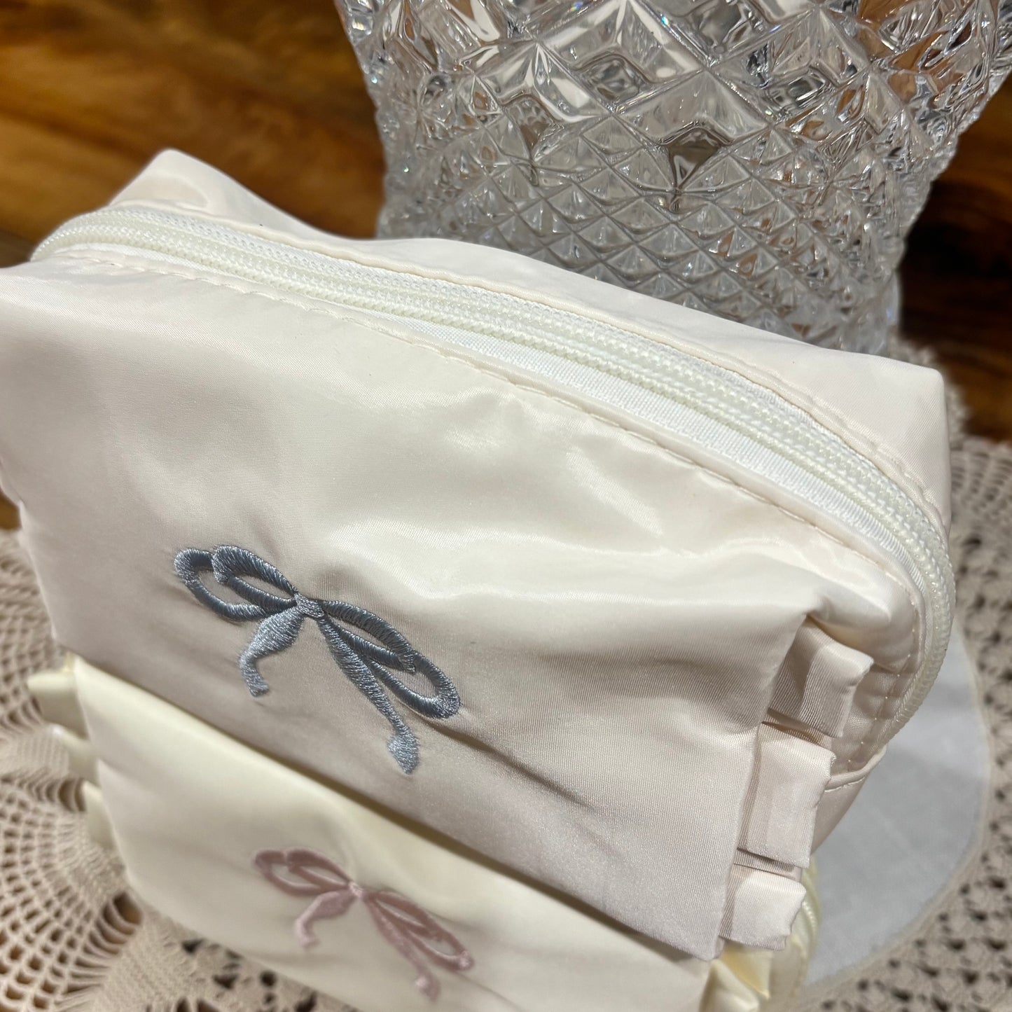 Cosmetic Bag Featuring Embroidered Blue or Pink Bow