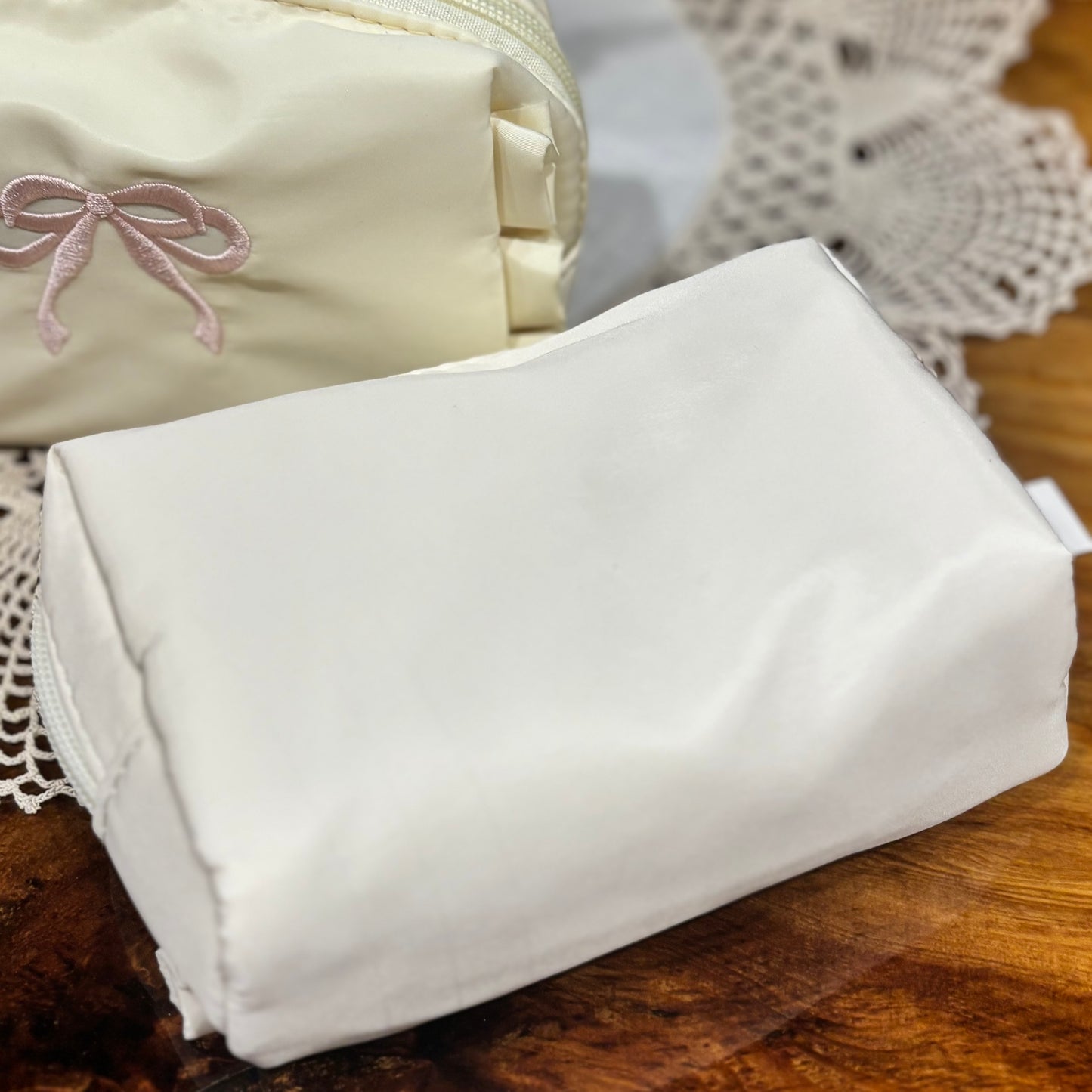 Cosmetic Bag Featuring Embroidered Blue or Pink Bow