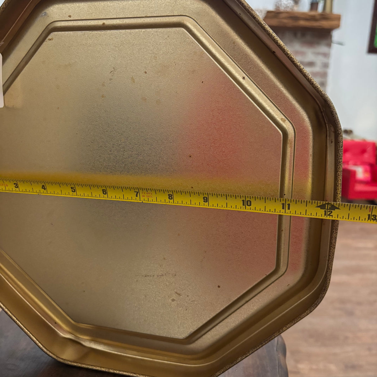 vintage octagonal metal wall hanging featuring a reproduction of the classic portrait "Master Simpson"by artist C. Bremont