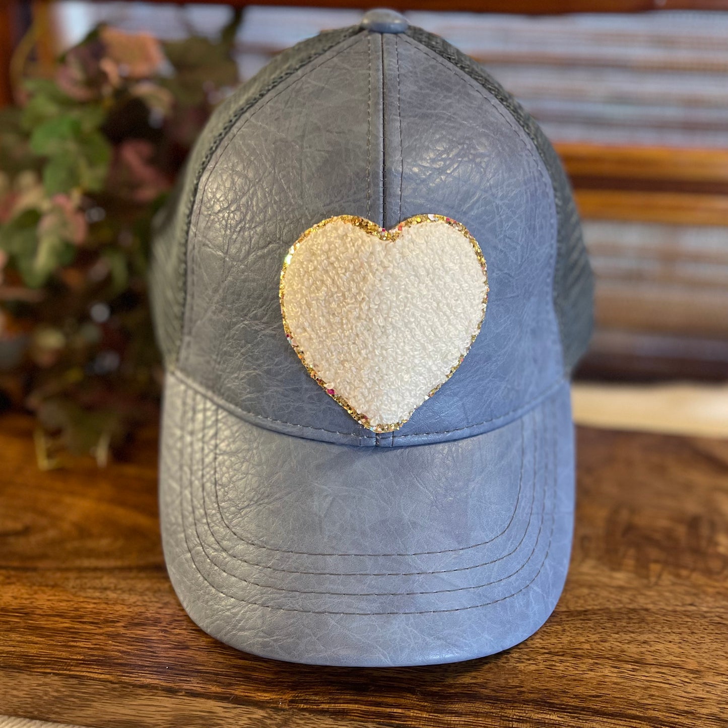 Faux Leather CC Trucker Hat With Ponytail Opening Cap With Chenille Heart Patch